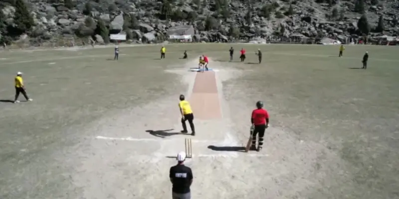 People playing Cricket at Pissan cricket ground
